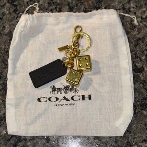 BLACK COACH HANGTAG WITH GOLDEN DICE BAG CHARM + DUST BAG
